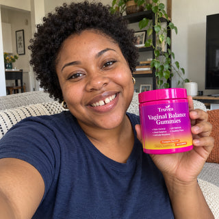 Customer holding Truvea gummies