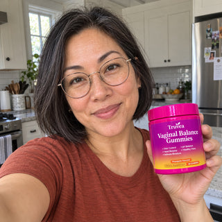 Customer holding Truvea gummies