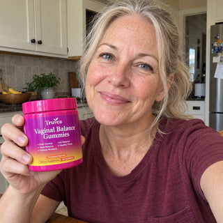 Customer holding Truvea gummies