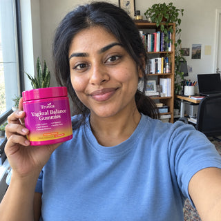 Customer holding Truvea gummies