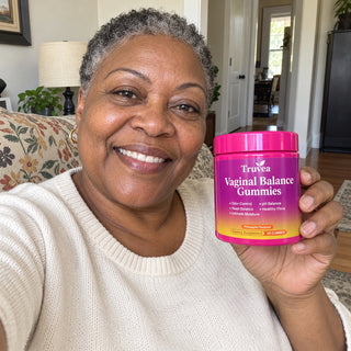 Customer holding Truvea gummies