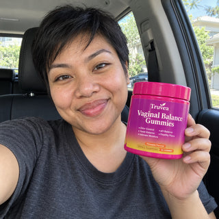 Customer holding Truvea gummies