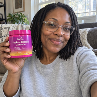 Customer holding Truvea gummies