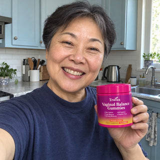 Customer holding Truvea gummies