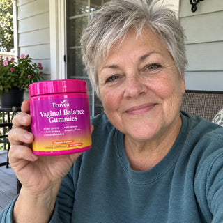 Customer holding Truvea gummies