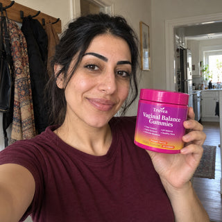 Customer holding Truvea gummies